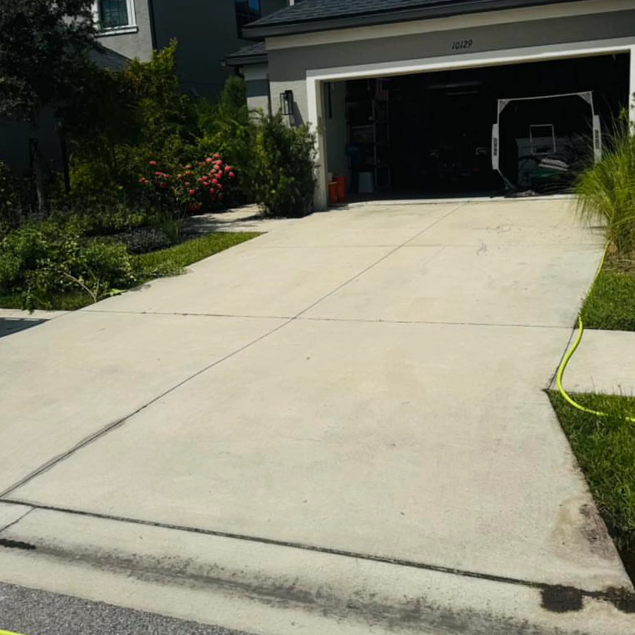 clean driveway and house exterior
