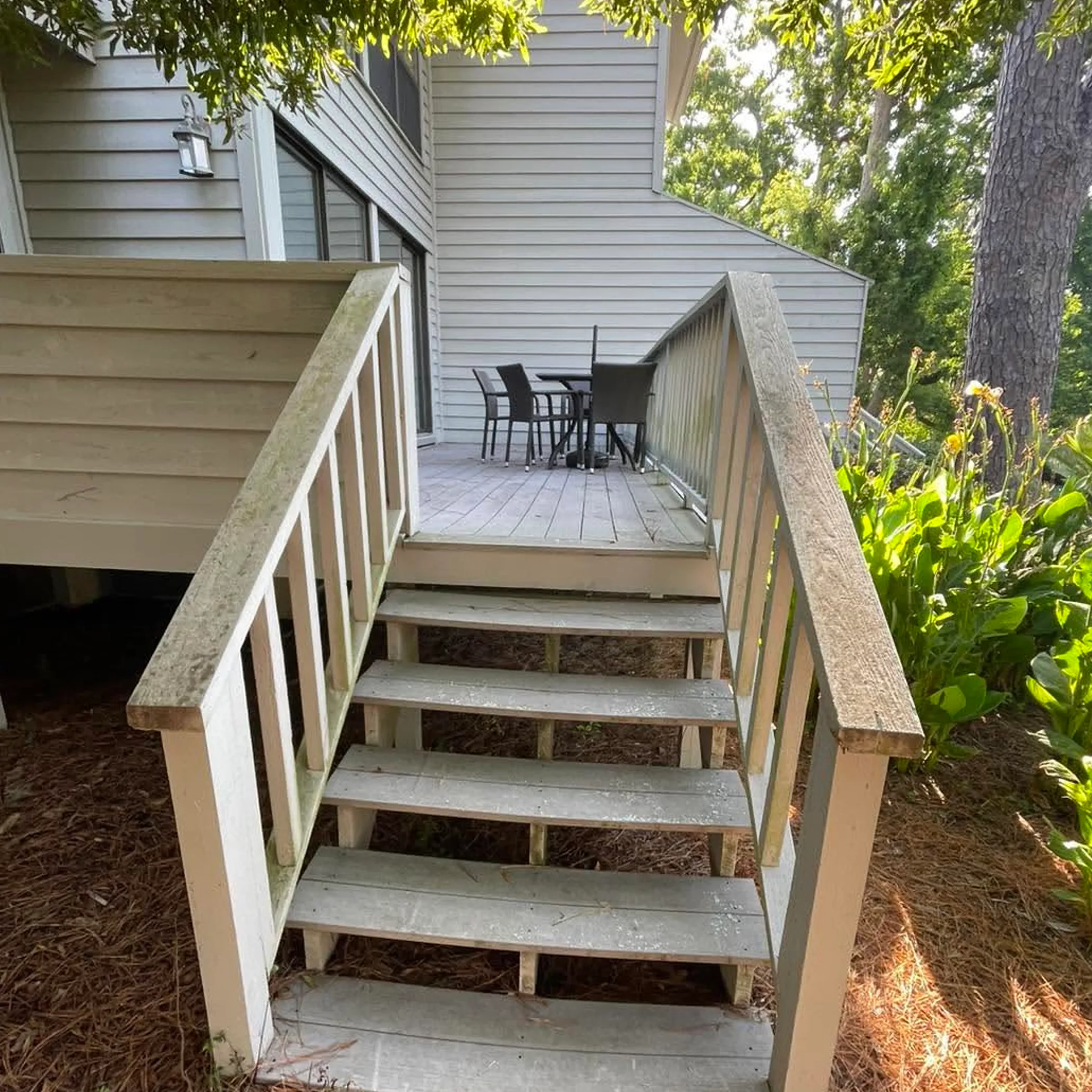weathered wooden stairs and porch exterior