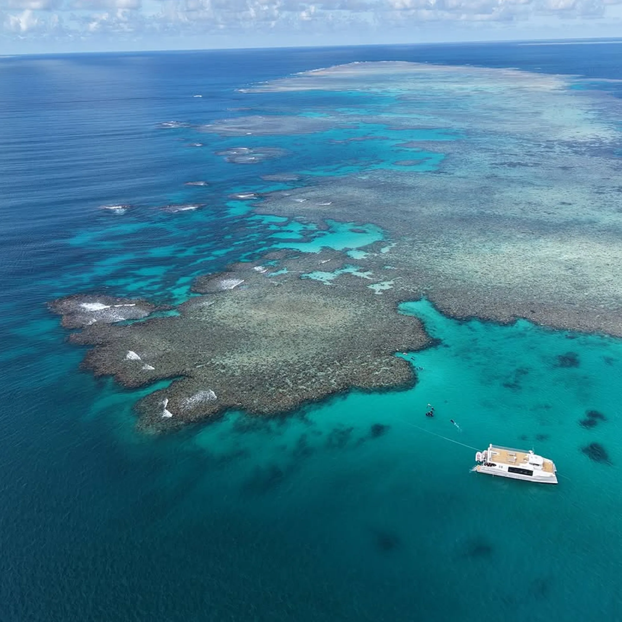 great barrier reef with boat